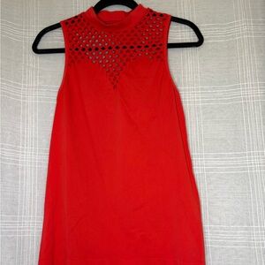 Red Sleeveless Top with Cutout Design.